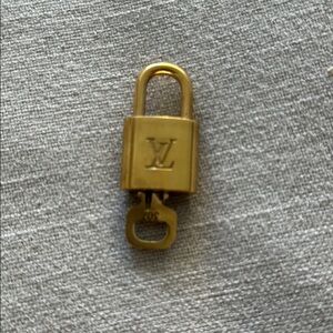 Authentic Louis Vuitton lock and key